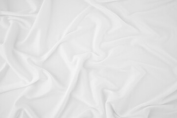 The white fabric crease background is suitable for placing cosmetics.