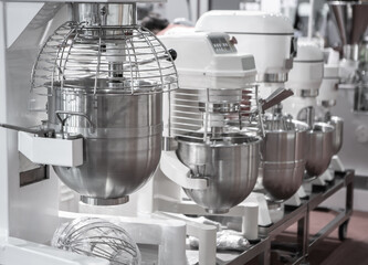 Close up of commercial bread mixer. Food mixing machine for food industry