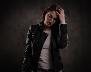 Young attractive woman has a photo shoot in a studio - studio photography