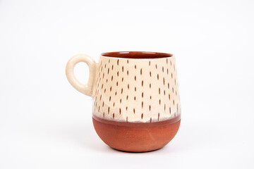 colored ceramic coffee cup on white isolated