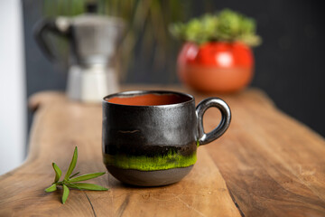 coffee with colorful mug on wooden table
