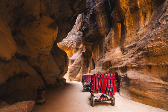 Horse cart through the Siq, main entrance to Petra in Jordan.