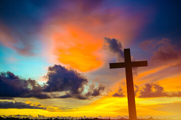 The Cross at the sunset background