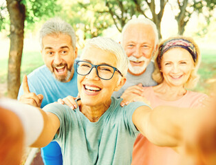 outdoor senior fitness woman man lifestyle active sport exercise healthy fit retirement selfie...