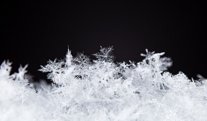Snowflake in the snow, winter season