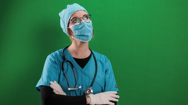 Thoughtful look of a young doctor - studio photography