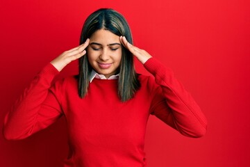 Young latin woman wearing casual clothes with hand on head for pain in head because stress. suffering migraine.