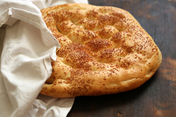 Fresh and hot sesame pita from the oven