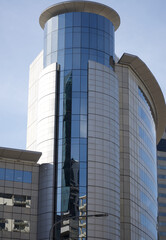 Tall Building In The Middle Of The City.