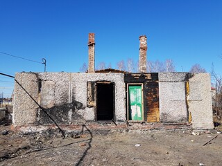 Old destroyed house after a fire
