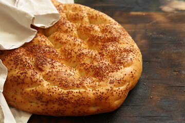 Fresh and hot sesame pita from the oven