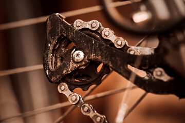 Close-up view of the rear sprocket on the derailleur of a sporty bicycle with gears - obrazy, fototapety, plakaty
