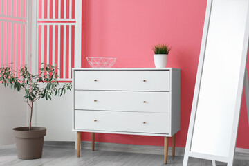 Chest of drawers in interior of stylish room