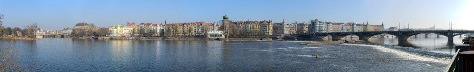 Panoramic view along Vltava river towards Smetanovo, embankment, Prague, Czech.
