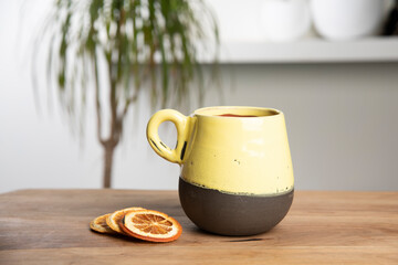 cup of coffee with handmade ceramic colorful coffee mug