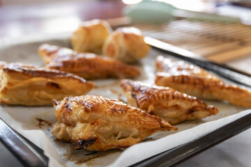 Homemade tuna puff pastry and sausage puff pastry just out of the oven.