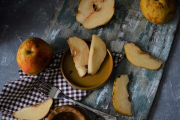 sliced apple on a wooden background