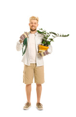 Young male gardener on white background