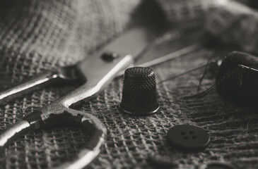 Sewing Thimble. Needle and thread. Scissors and a centimeter are the tools of a tailor, fashion designer, seamstress