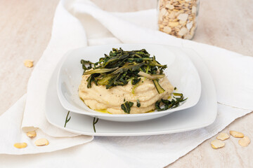 The traditional recipe from Puglia: chicory with fave beans puree. Vegan recipe