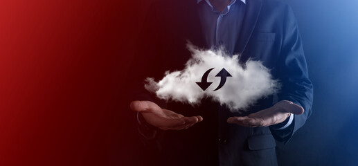 Cloud technology. Polygonal wireframe cloud storage sign with two arrows up and down on dark . Cloud computing, big data center, future infrastructure, digital ai concept. Virtual hosting symbol