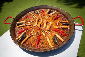 Traditional seafood paella in the fry pan