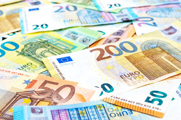 Different euro bills as financial background.