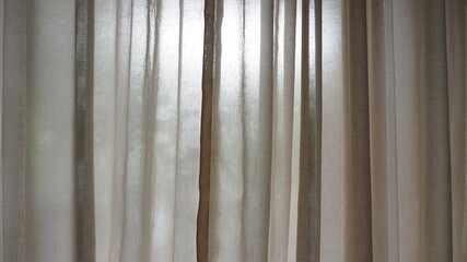 Sunlight and brown curtain in the room 