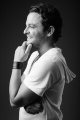 Studio shot of Italian man in black and white