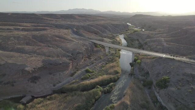 Bridge and river sunrise near Lake Las Vegas Nevada desert aerial drone 4k ungraded flat log raw dlog footage