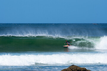 Surfing the barrel in Costa Rica