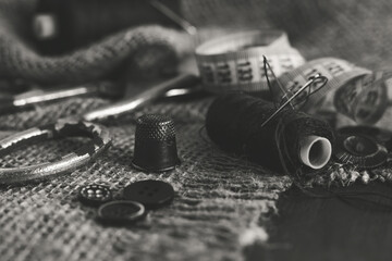 Sewing Thimble. Needle and thread. Scissors and a centimeter are the tools of a tailor, fashion designer, seamstress - obrazy, fototapety, plakaty
