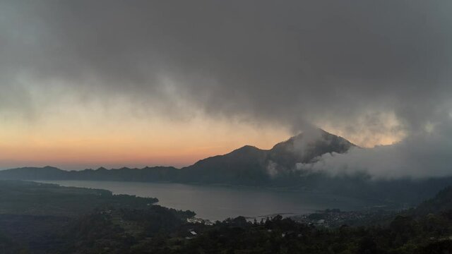 Landscape of Mount Batur Volcano and Lake in Kintamani, Bali, Indonesia - Sunset Time Lapse
