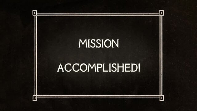 A re-created film intertitle from the silent movies era, the words Mission Accomplished inside a 1920's frame.
