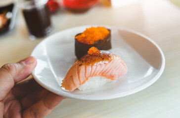 Salmon sushi grill top with sweet miso.