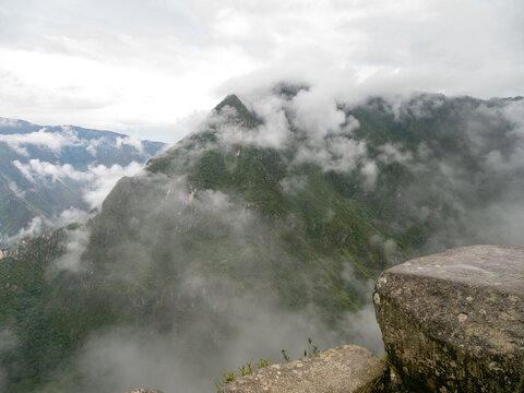 Aerial view of cloud covered mountains from Machu Picchu 