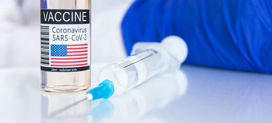 American vaccine banner, covid-19 and coronavirus vaccination in USA by using vaccine vial and syringe