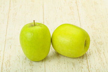 Two ripe green sweet apples
