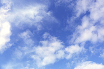 Naklejka na ściany i meble Beautiful blue sky with white clouds outdoors