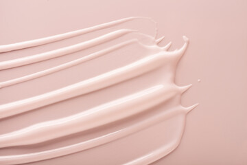 Milky pink cosmetic cream texture background
