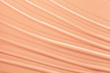 Texture of smudge cosmetic bb or cc cream foundation liquid background