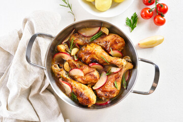 Chicken drumsticks baked with apples