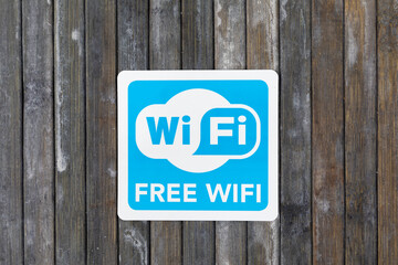 A blue and white free wifi sign