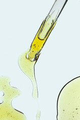 Liquid pipette gel or serum on glass of microscop background