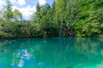 Fototapeta na wymiar Croatia. Plitvice Lakes National Park. Lake with crystal clear turquoise water. Popular tourist spot. Listed as a UNESCO World Heritage Site