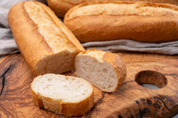 Ingredient for French breakfast, fresh baked crispy baguette white bread