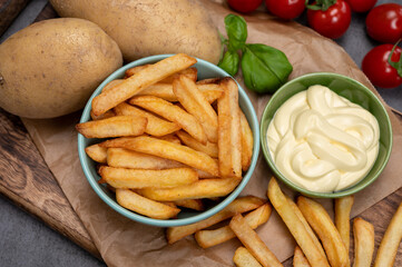 Bown with fresh cooked french fries potato chips with belgian mayonnaise sauce