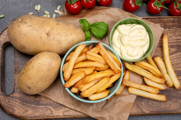 Bown with fresh cooked french fries potato chips with belgian mayonnaise sauce