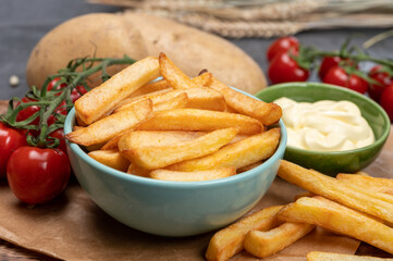 Bown with fresh cooked french fries potato chips with belgian mayonnaise sauce