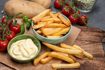 Bown with fresh cooked french fries potato chips with belgian mayonnaise sauce